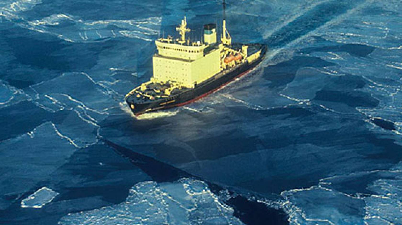 ship sailing through polar ice