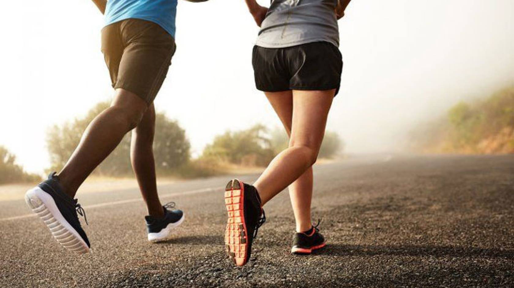 Man and woman jogging together