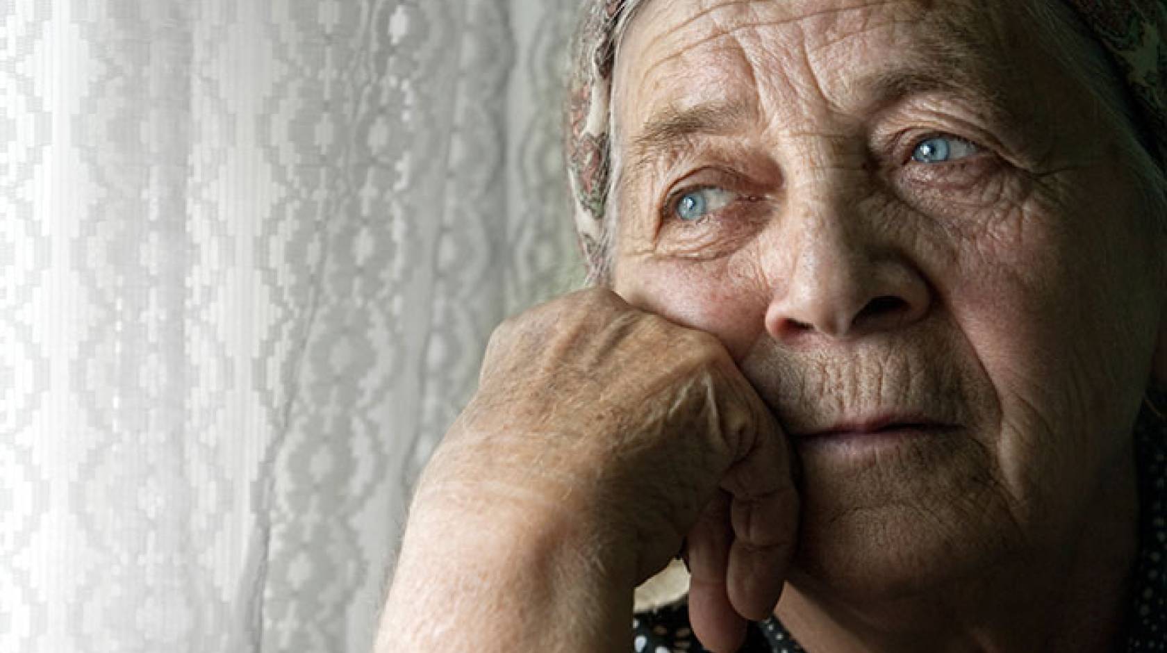 pensive elderly woman