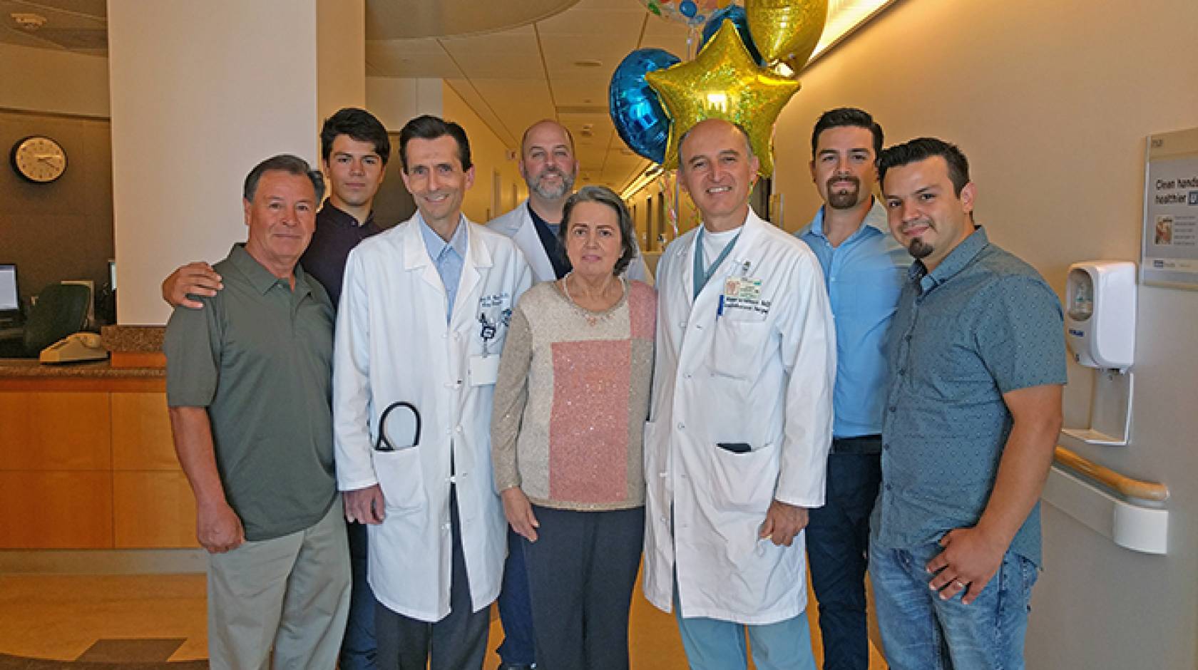 Elba De Contreras, the recipient of the 1,000th lung transplant performed at UCLA, along with members of her family and her transplant team.
