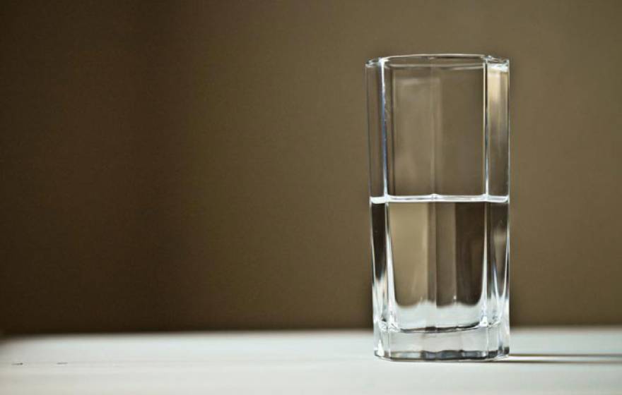 Glass half filled with water