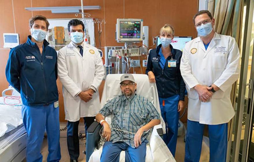Gomez Gil in hospital with UC San Diego Health team