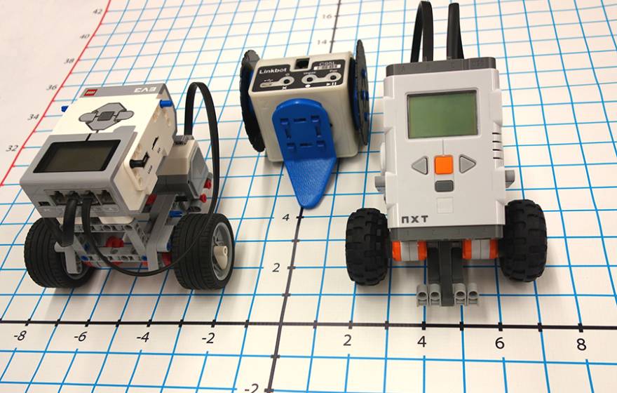 Three robots on a grid