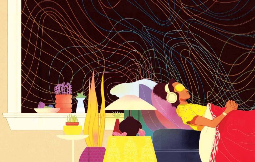 Colorful, psychedelic illustration of a woman of color lying in bed with a sleep mask and headphones on