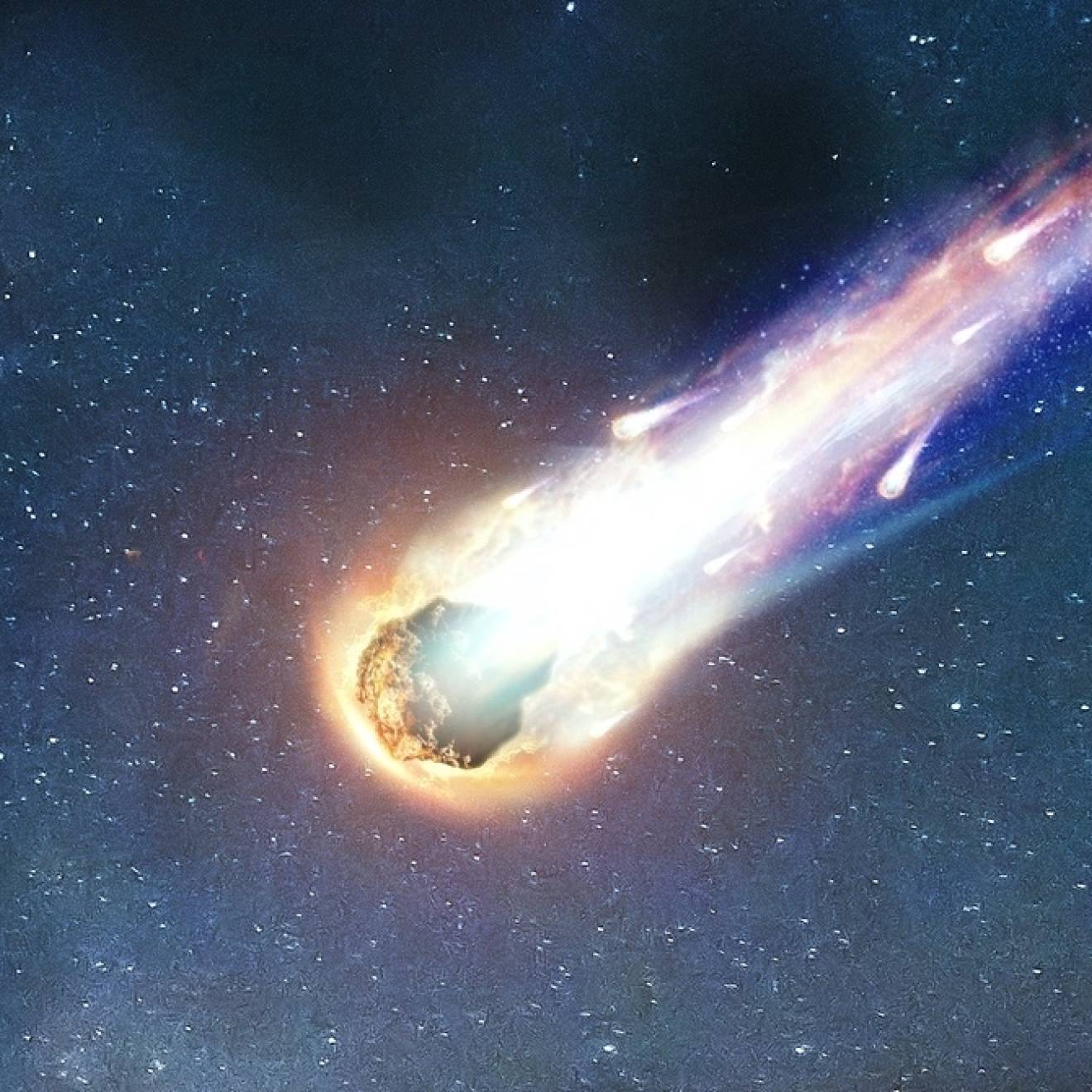 Realistic illustration of a comet with a colorful tail streaking through space, tailed by 2 smaller asteroids