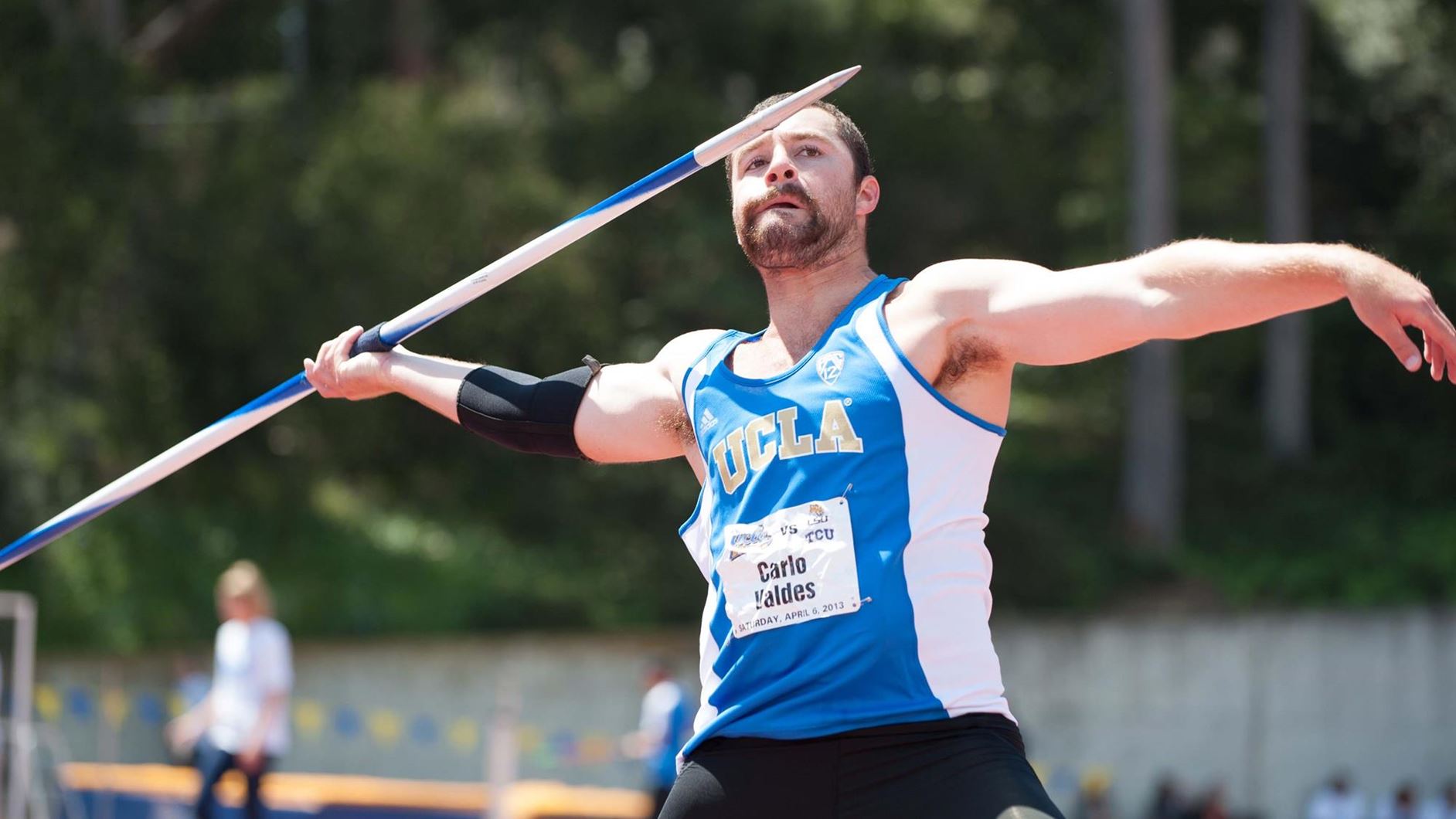 Carlo Valdes throws the javelin while at UCLA
