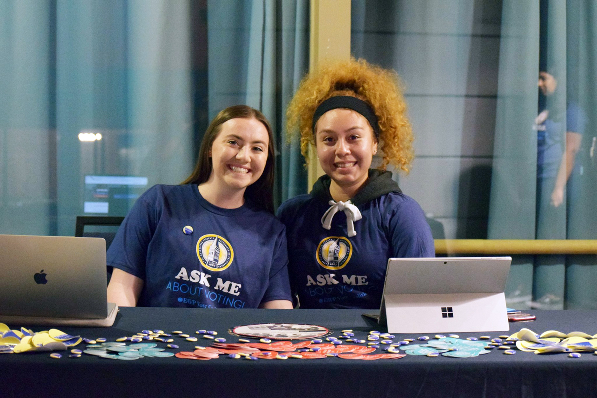 Two UC students at a voting drive