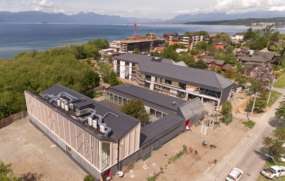 Aerial shot of the Local Development Center – Villarica next to the water