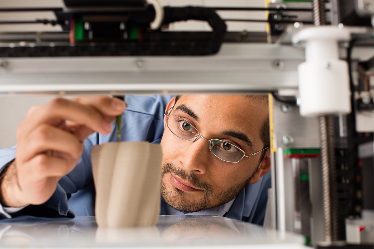 Gaurav Sant working on a project in a lab