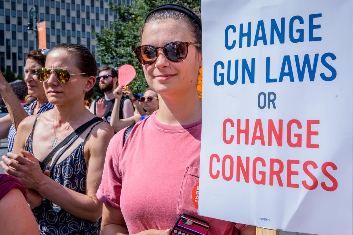 Change gun laws or change Congress' reads a sign at a 2018 rally in New York City