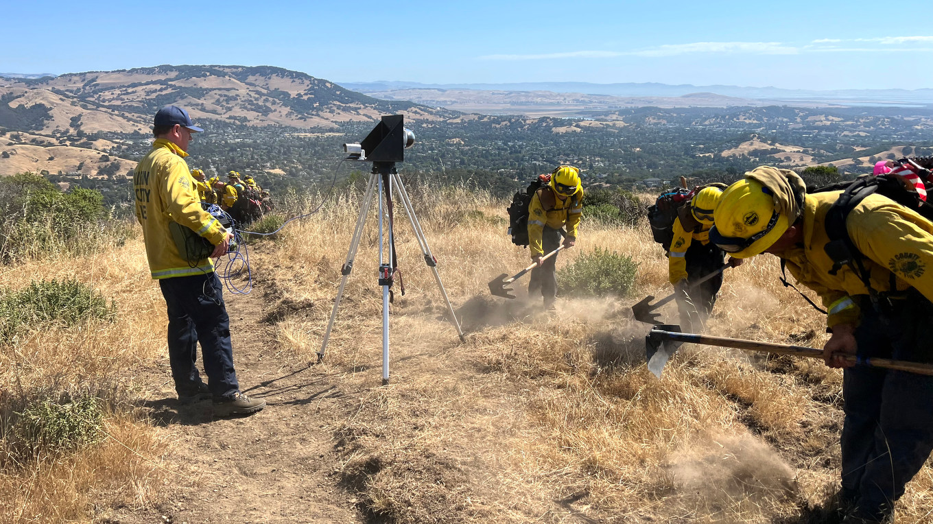 Members of the fire crew working on the ground