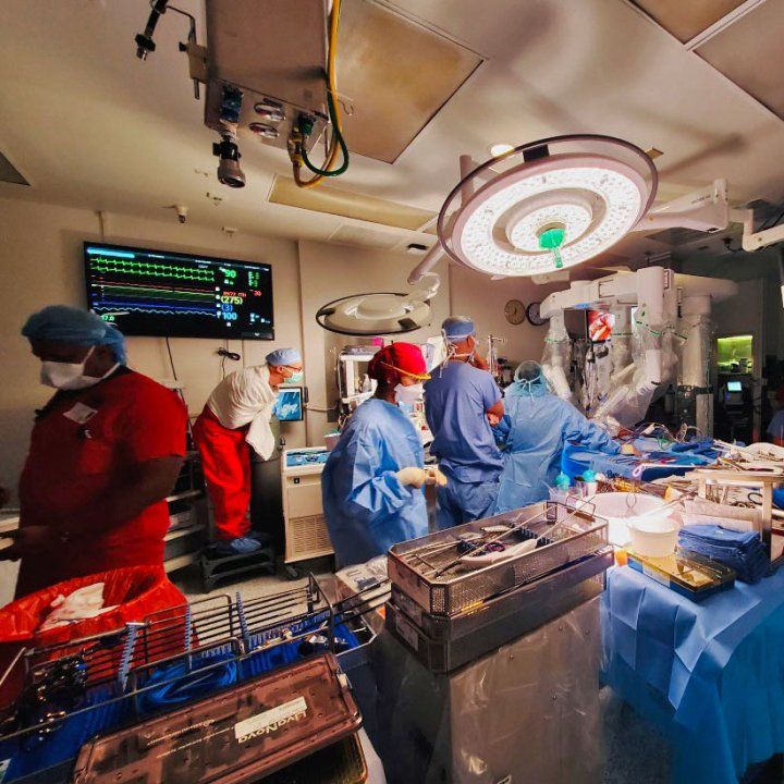 Surgeons taking part in the robotic cardiac surgery