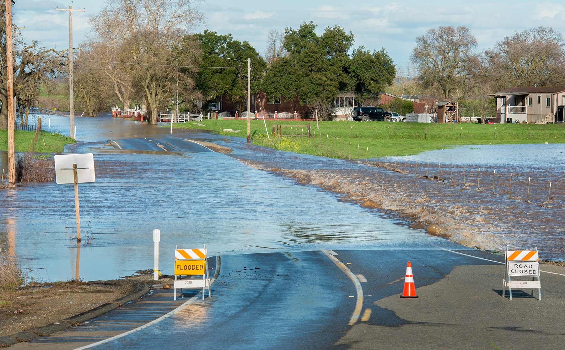 Flooded closed off road