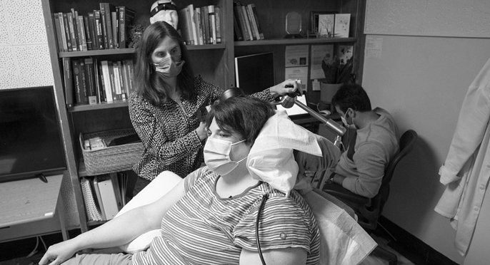 Woman patient sitting in an office