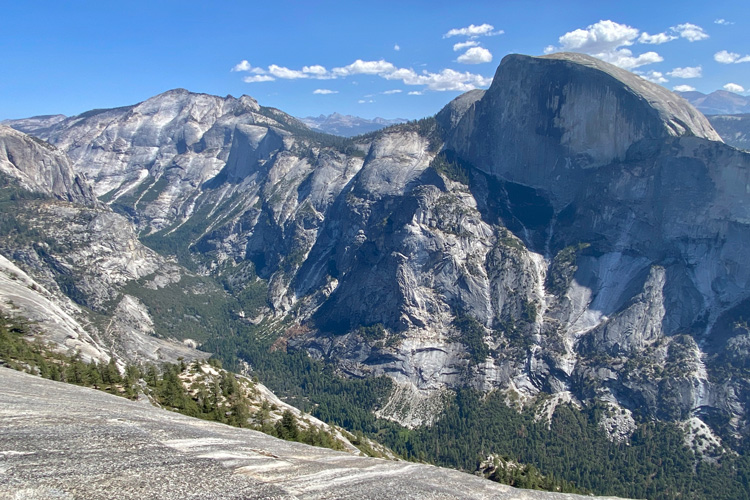 View of Tenaya Canyon as seen from North Dome, with Half Dome on the right. 