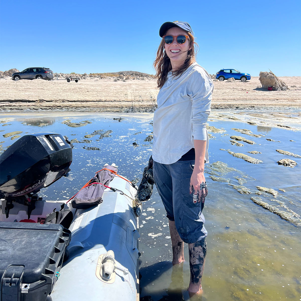 Meg Slattery standing ankle deep in the Salton Sea