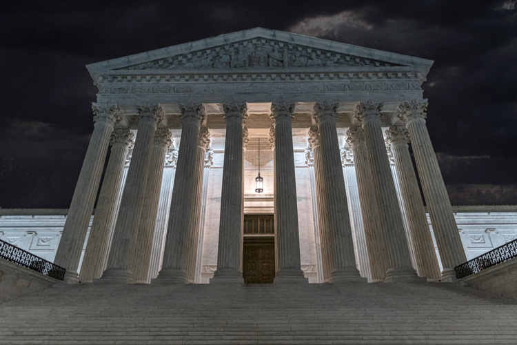 SCOTUS building at night