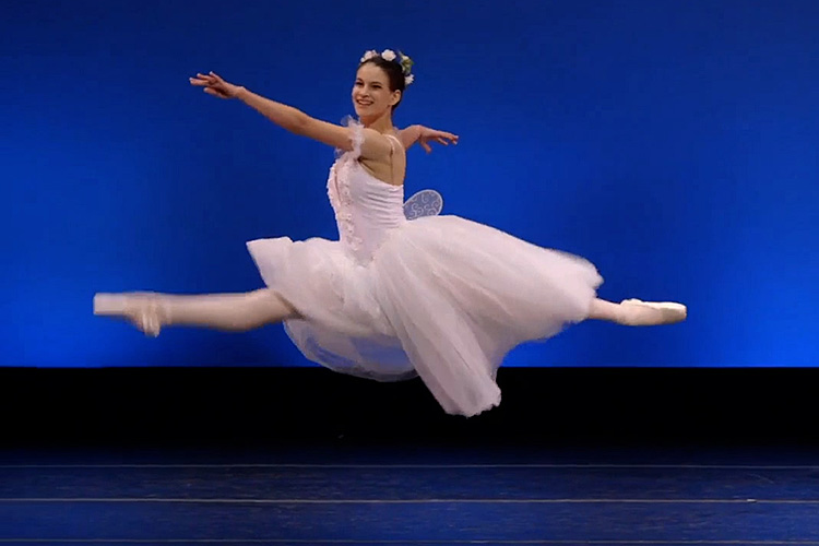 Catey Vera during a ballet competition, in a tutu