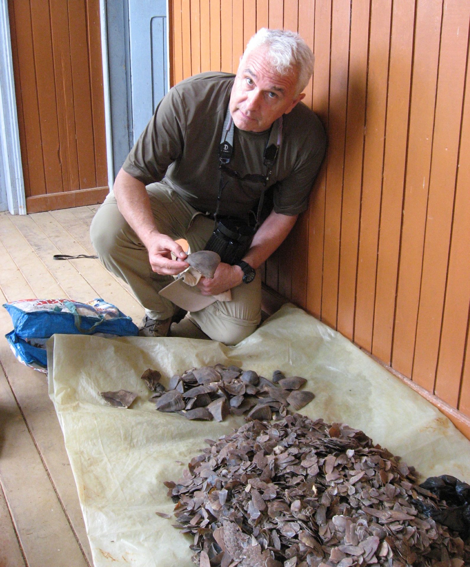 Tom Smith holding pangolin scales
