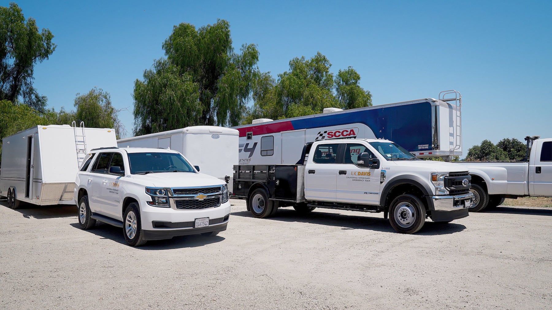 Trucks with trailers in a parking lot