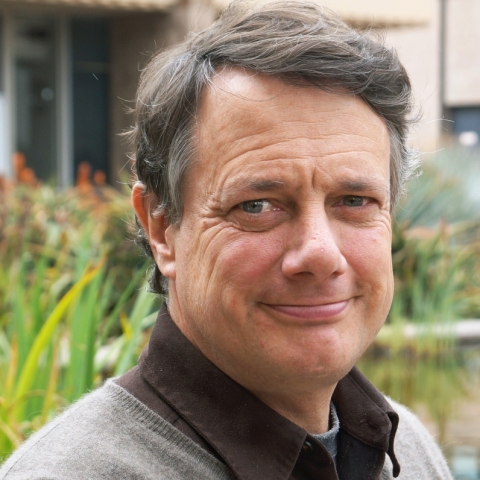 Chris Funk, middle-aged man with gray hair, portrait