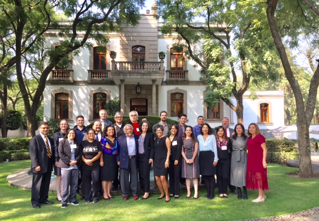 UC alumni and staff gather in front of Casa de California