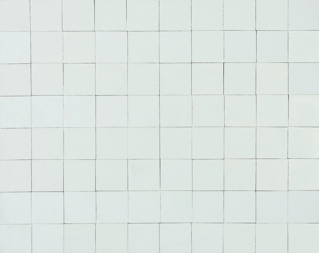 A grid of gray/green square tiles