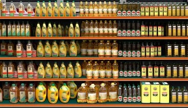 Grocery shelves showing many different kinds of oils in jars and bottles