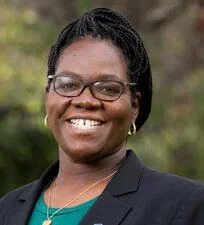 Smiling African American woman with glasses