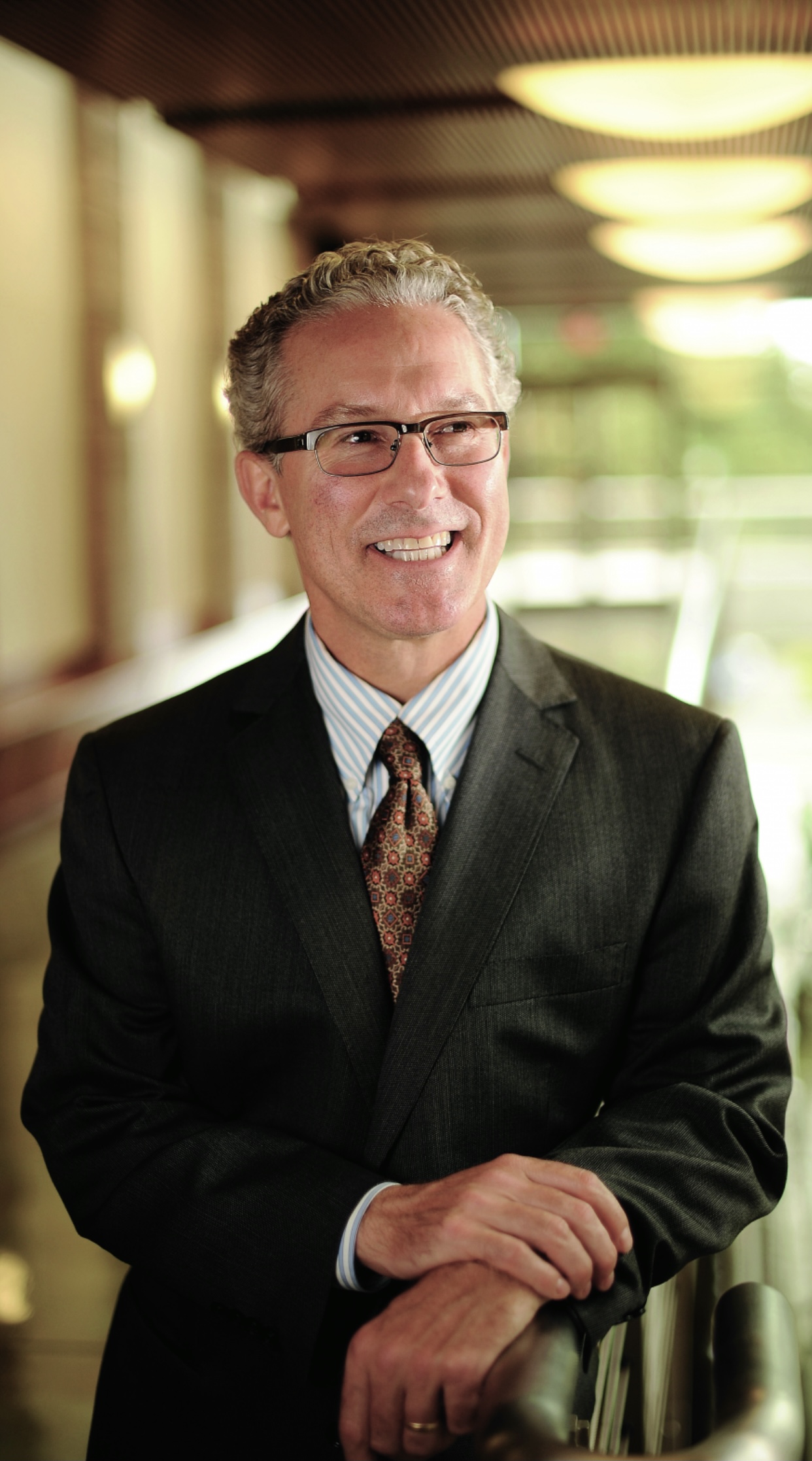 A portrait of Rich Lyons, clean-shaven, in a suit, as dean of Haas School of Business