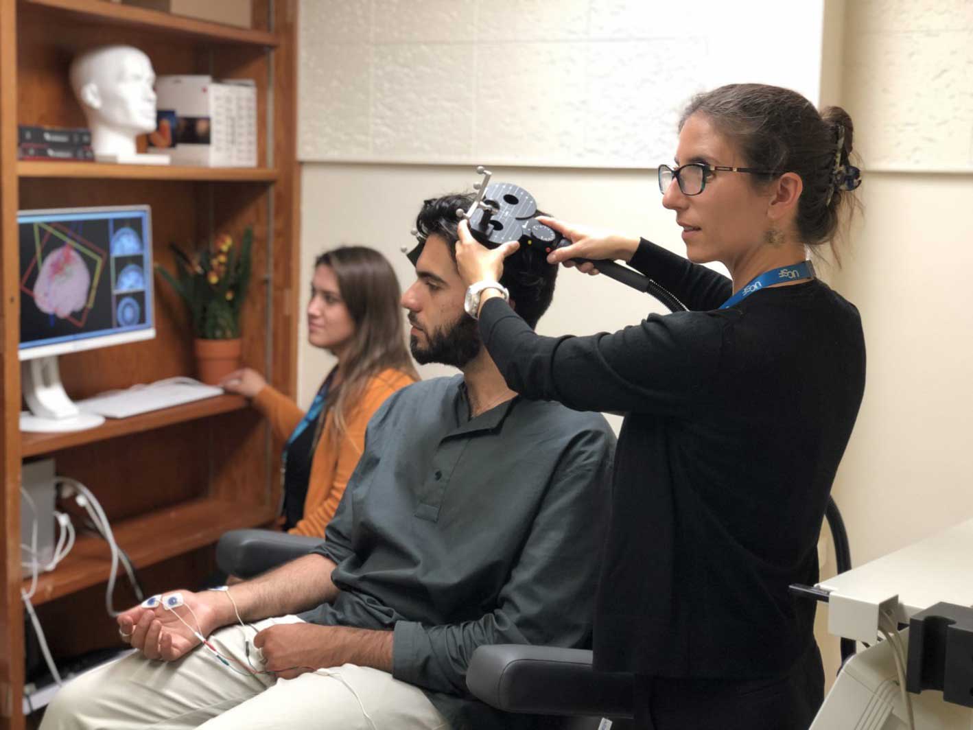 a doctor works with a patient