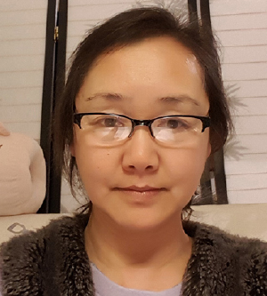 Yan Li, woman with glasses and hair pulled back