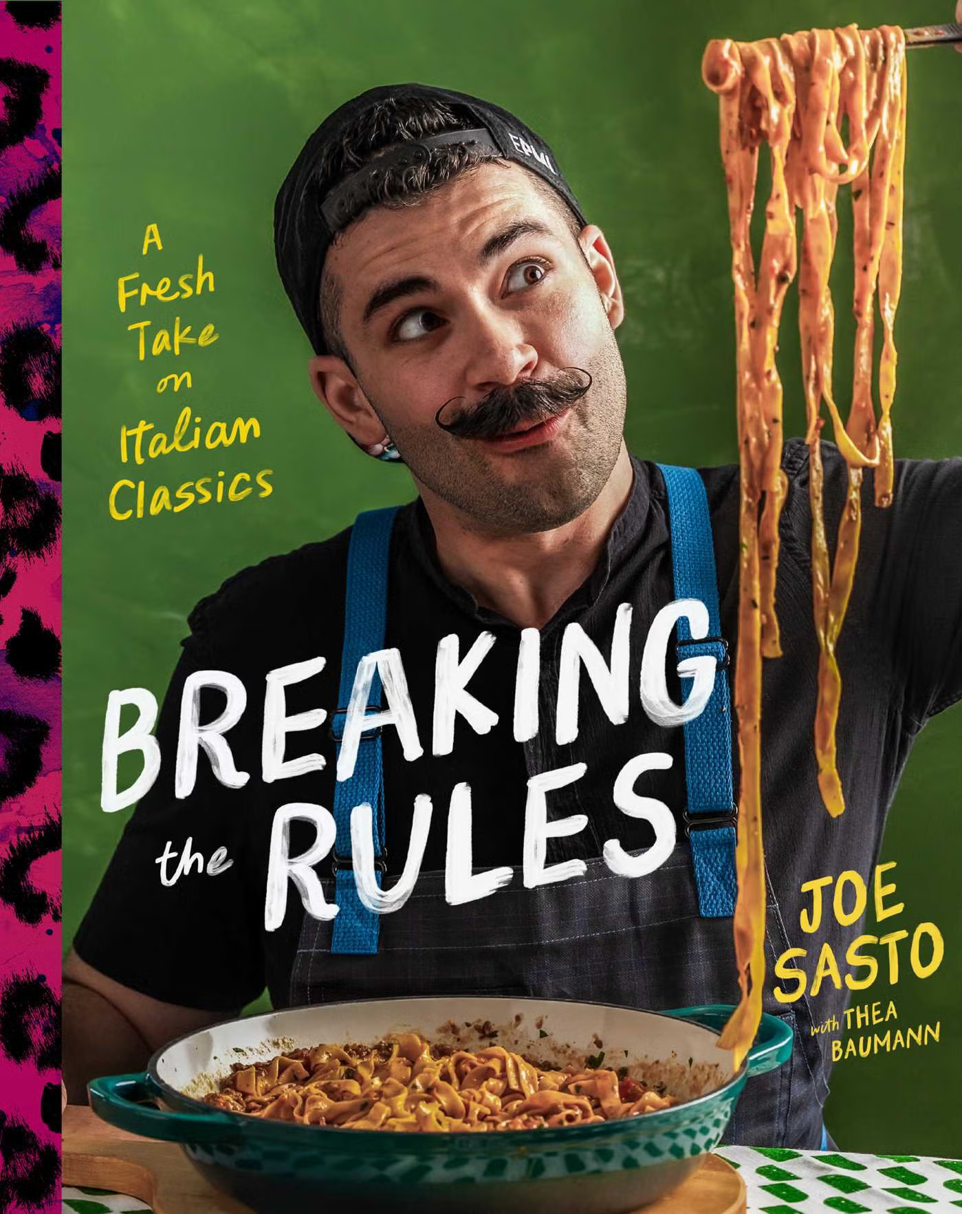 A cookbook cover featuring the text Breaking the Rules and a man with a mustache holding up spaghetti on a fork