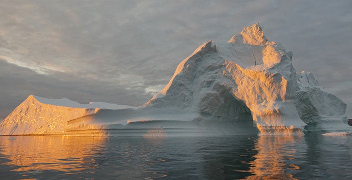 An iceberg in the water during the afternoon