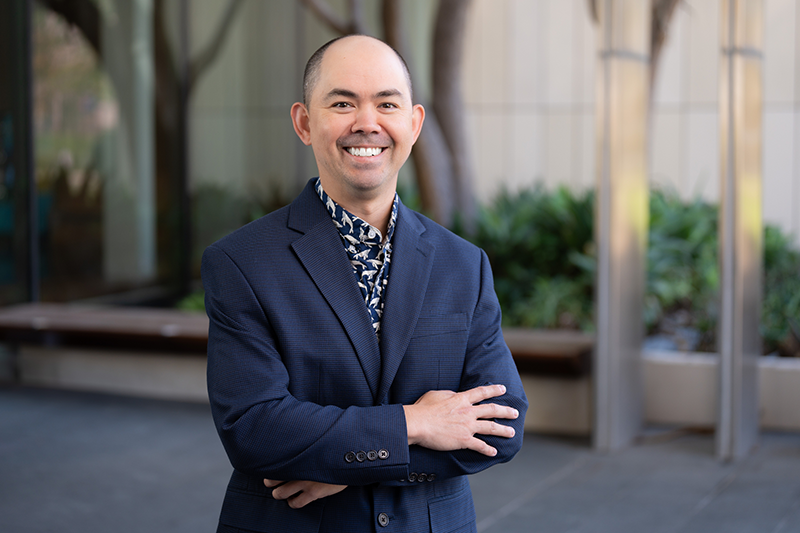 A man in a blue jacket, Michael Corley