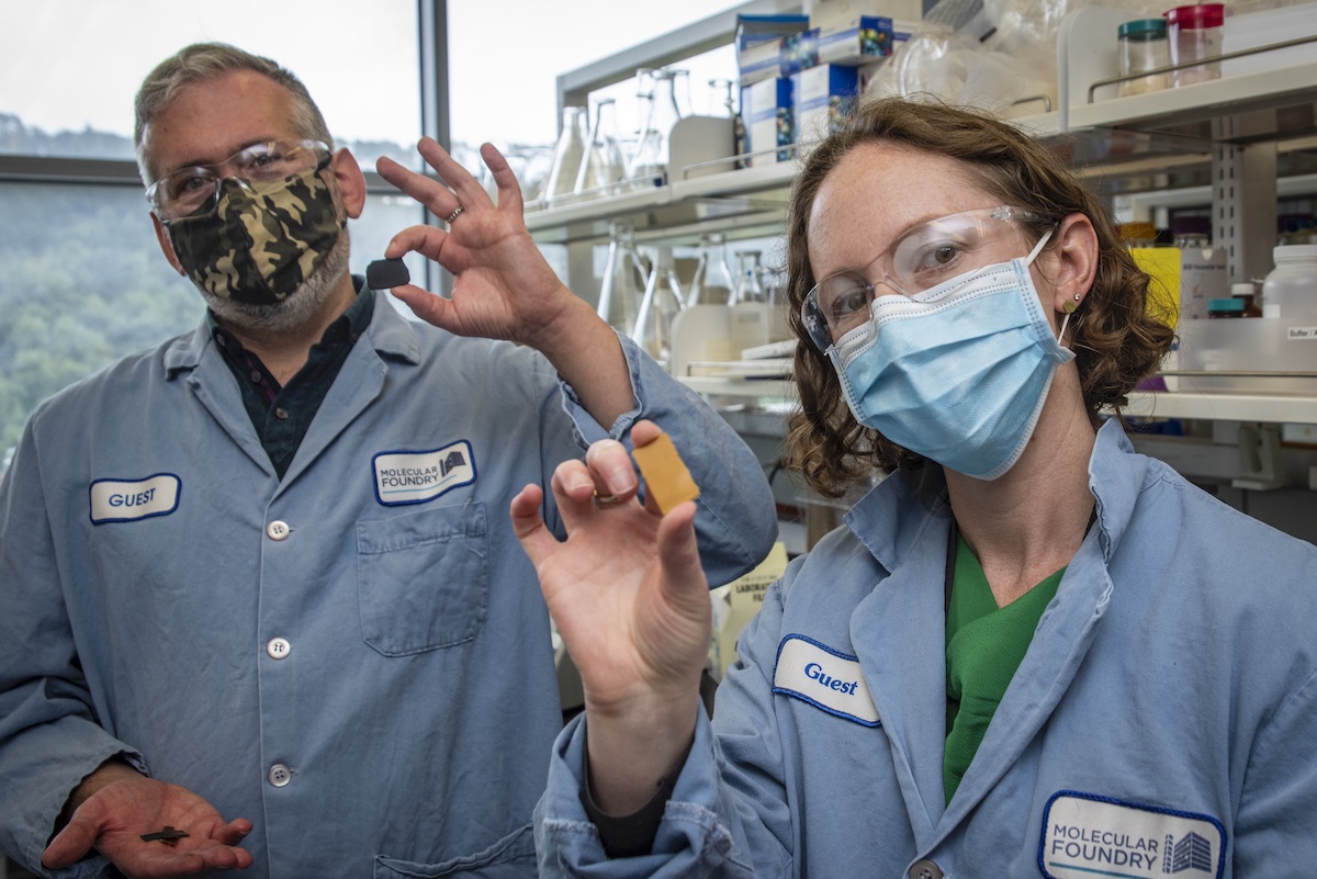 Berkeley Lab scientists Brett Helms (left) and Corinne Scown hold samples of PDK plastic, a unique new material that can be recycled indefinitely – 