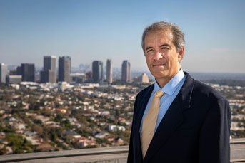 Jesus Araujo with skyline behind him