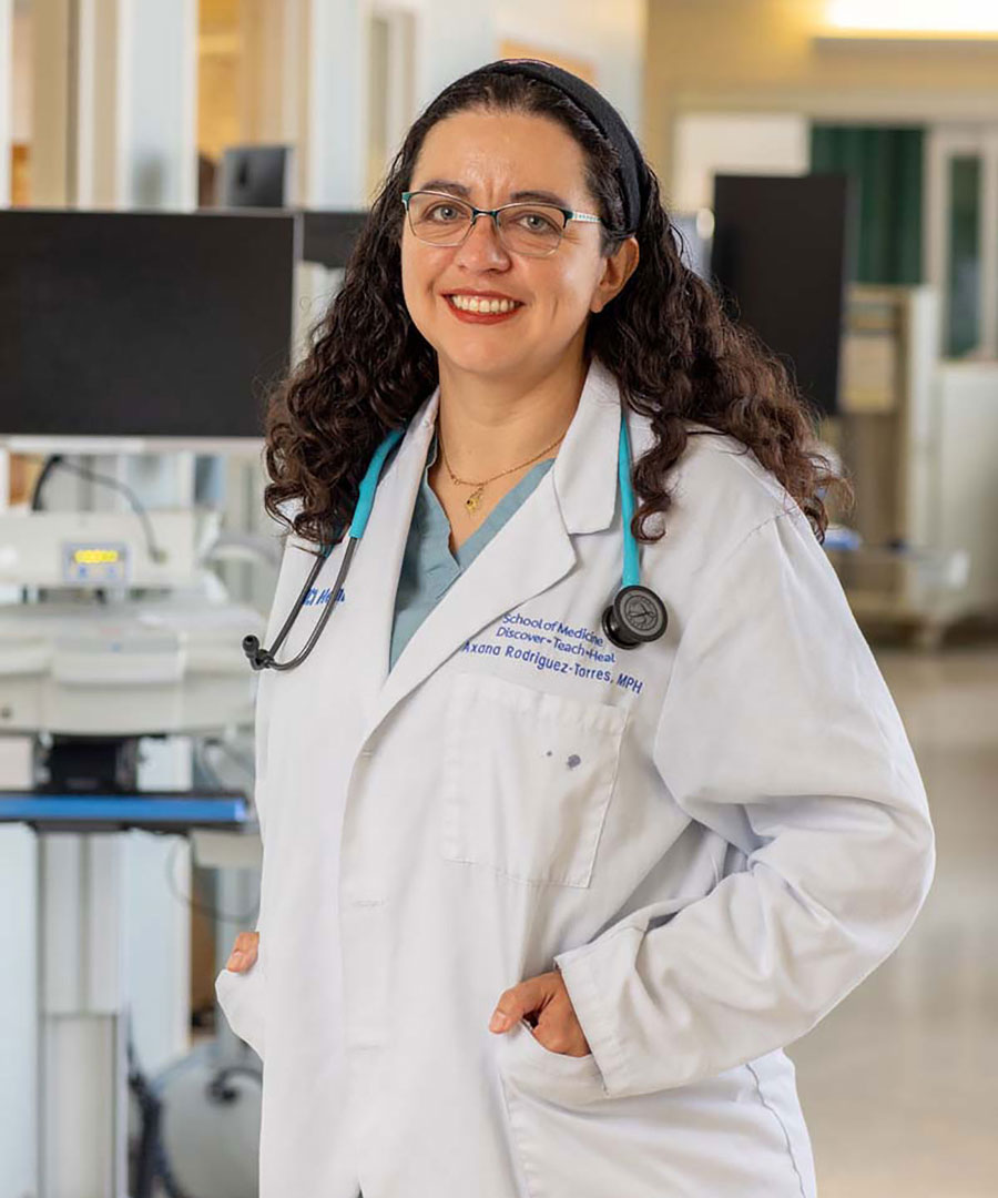 Axana Rodriguez-Torres in her white doctor's coat