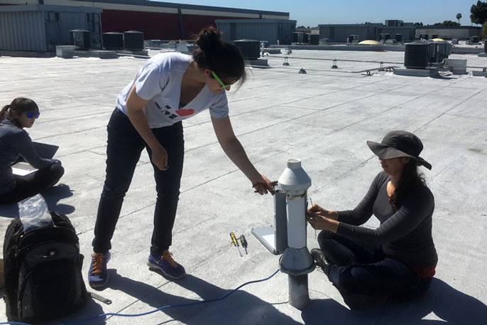 Two young women set up a BEACON