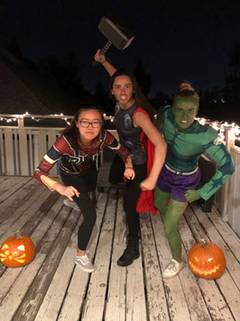 Anna and friends dressed as Marvel superheroes for Halloween.