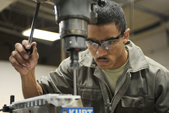 man working with machinery