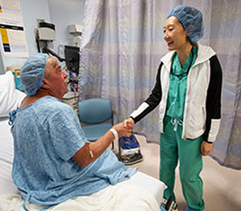 Connie Yue with Wesley Watson in the hospital