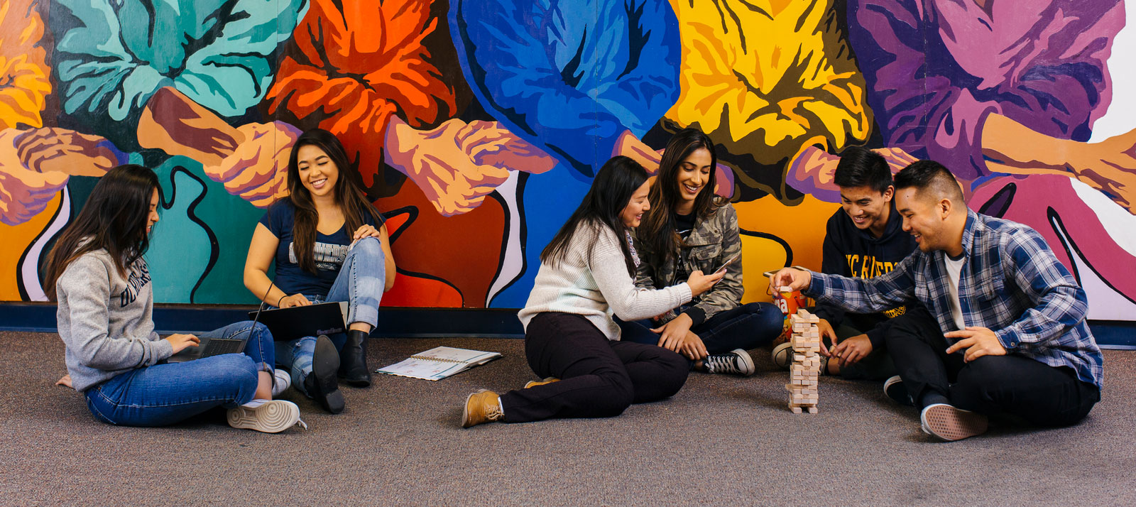 People at an Asian Pacific Cultural Center play games