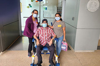 Federico Gomez Gil leaving the hospital with his family