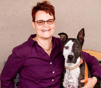 Katja Guenther with her pitbull Monkey