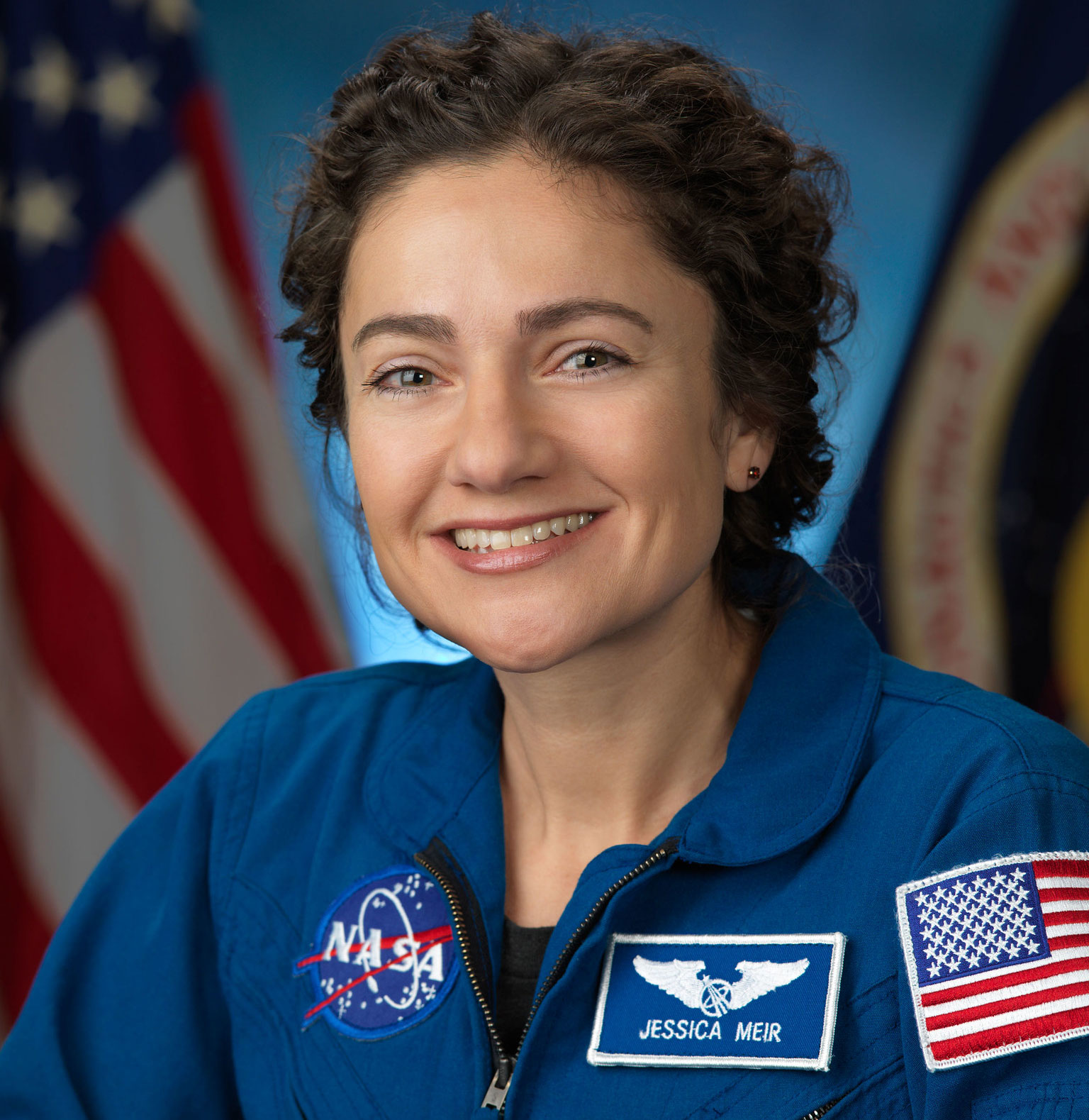 Jessica Meir in astronaut suit