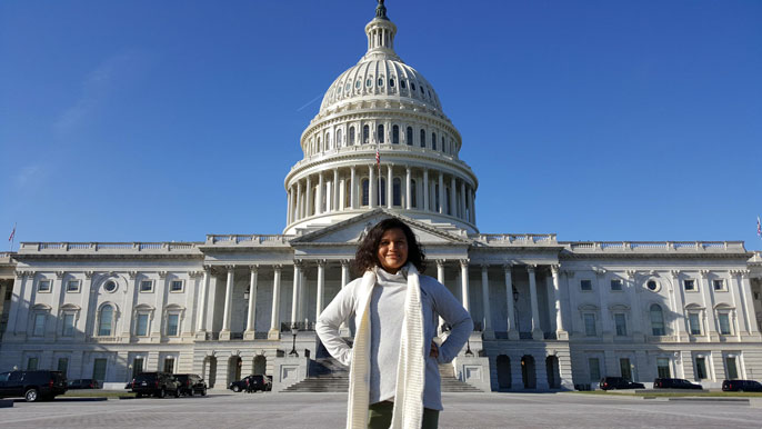 Josefina Flores Morales in front of the Capitol building