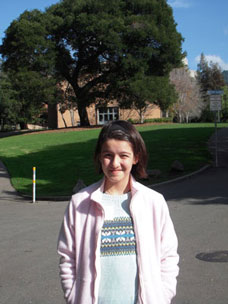 Leyla Kabuli in front of Morrison Hall age 10