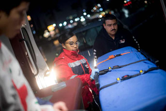 Students accompany an ambulance