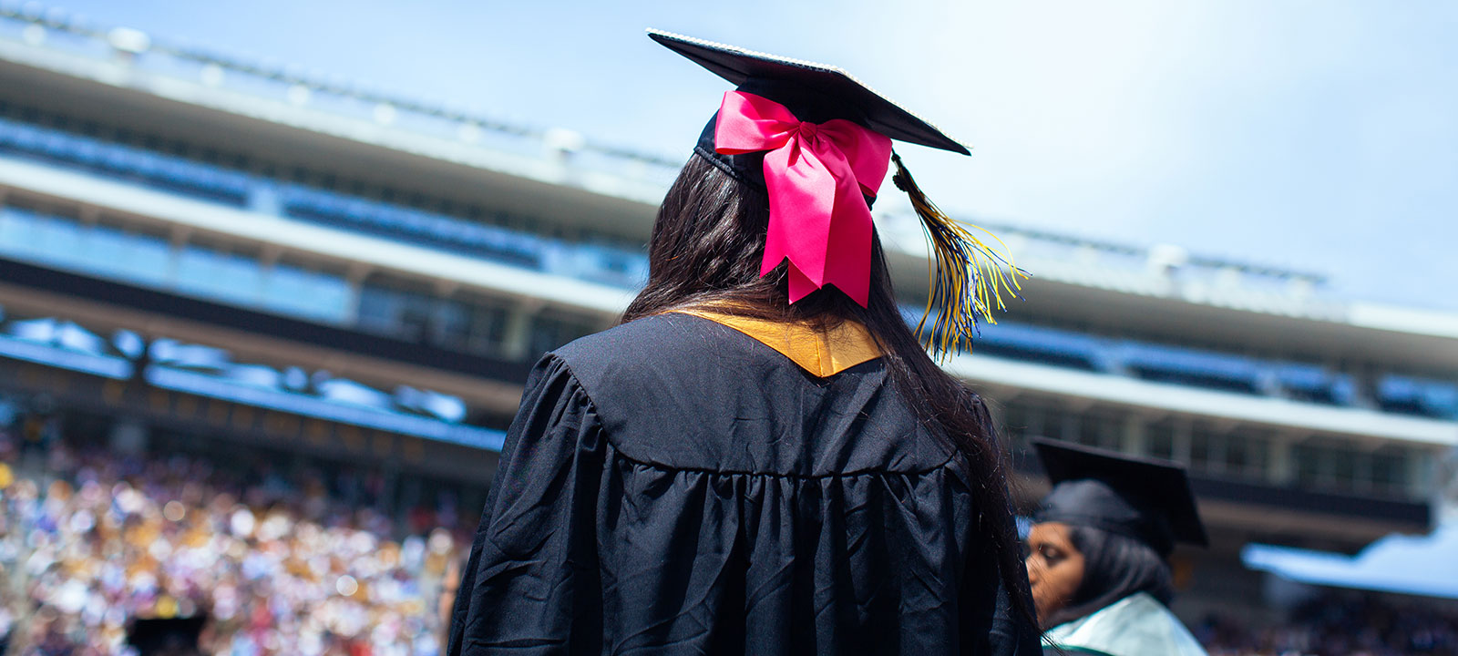 View of student in commencement cap and gown